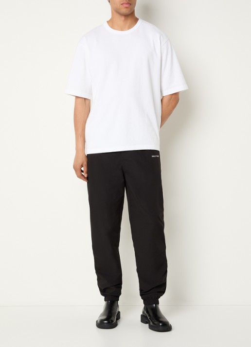 Daily Paper Eward tapered fit trackpants met logo en steekzakken - voorkant 2 zwart