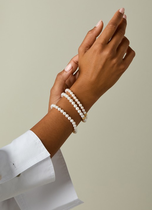 Diamond Point Geelgouden armband Rivièra - detail wit