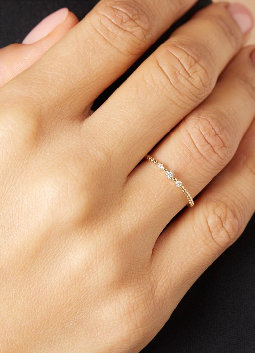 Diamond Point Joy ring van 14 karaat geelgoud met 0.07 ct diamant - voorkant 2 goud