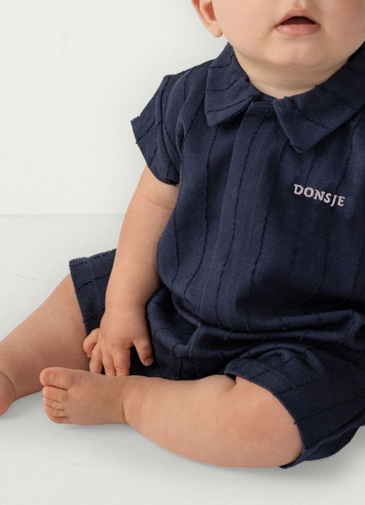 Donsje Amsterdam Kajani ribgebreide playsuit met logoborduring - voorkant 3 beige