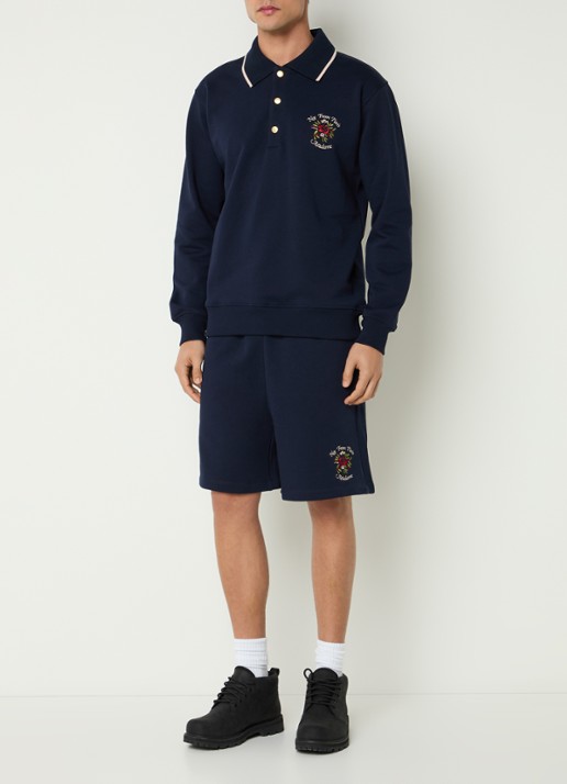 Drôle de Monsieur Slogan Rose regular fit polo met logoborduring - voorkant 2 donkerblauw