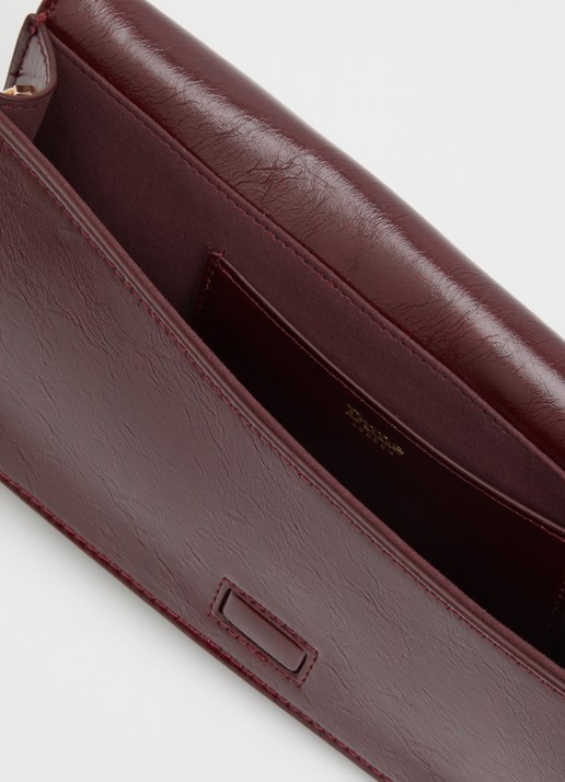 Dune London East To West Long clutch met crocostructuur - detail 3 bordeauxrood