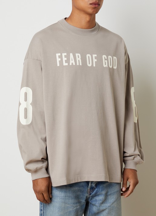 Fear of God Essentials Merch longsleeve met logo- en backprint