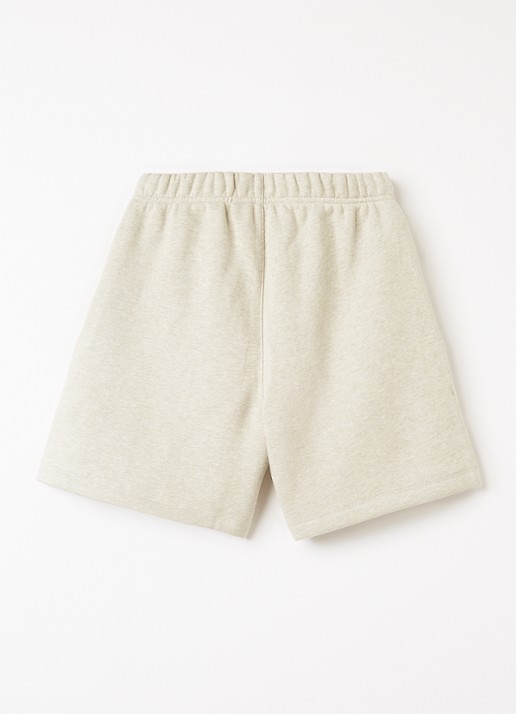 Fear of God Essentials Wide fit korte joggingbroek met logoprint - voorkant 2 lindegroen