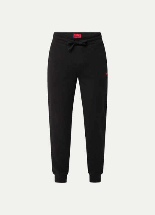 HUGO Austin pyjamabroek met steekzakken - voorkant zwart
