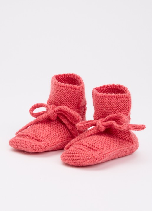Hvid Babyslofjes van merino wol - voorkant 3 donkerroze