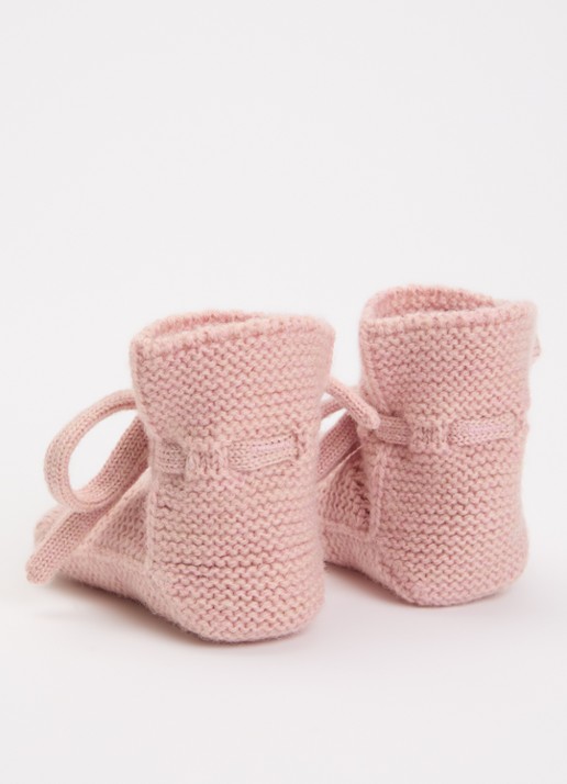 Hvid Babyslofjes van merino wol - voorkant 2 lichtroze