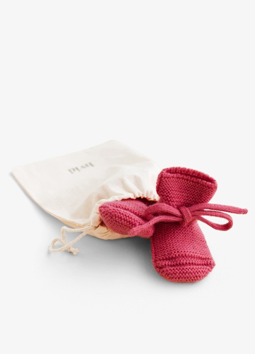 Hvid Babyslofjes van merino wol - detail donkerroze