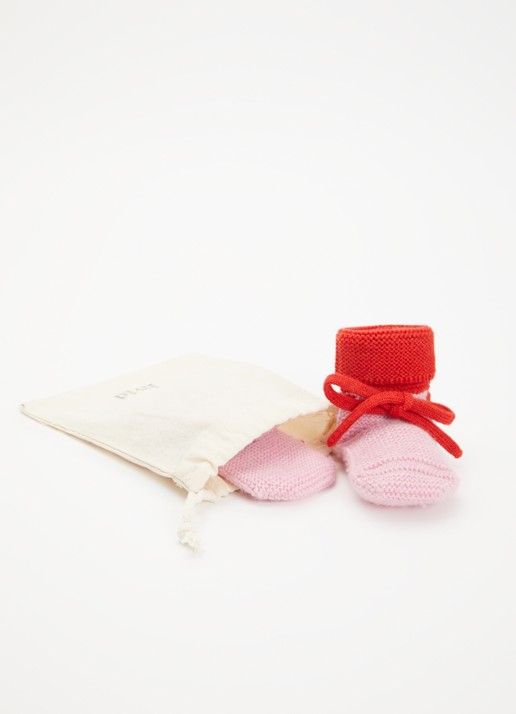 Hvid Babyslofjes van merino wol  - detail roze