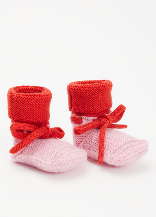 Hvid Babyslofjes van merino wol  - voorkant 2 roze