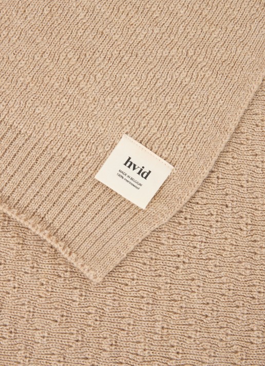 Hvid Dora wiegdeken van merino wol 95 x75 cm - detail donkerbeige