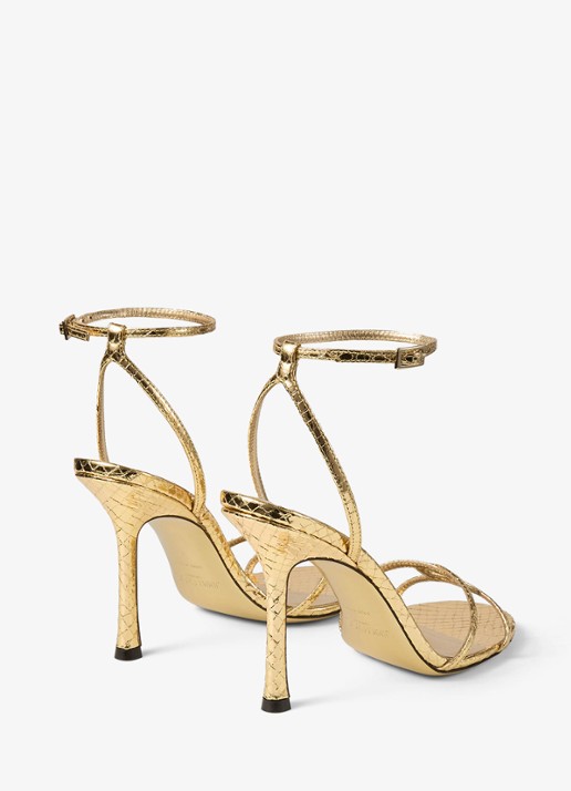 Jimmy Choo 1998 Leo 100 sandalette van geitenleer met slangenstructuur - achterkant goud