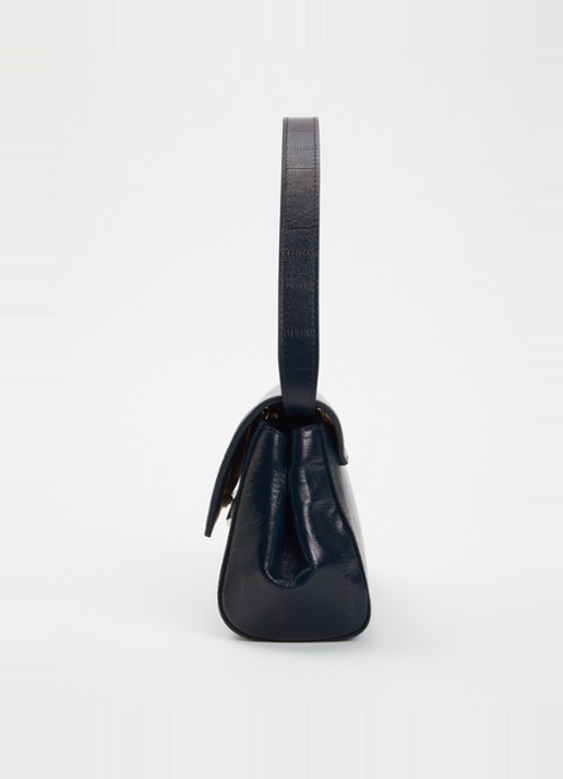 KAAI Ikon clutch van kalfsleer met textuur en afneembare schouderriem - detail 3 petrol