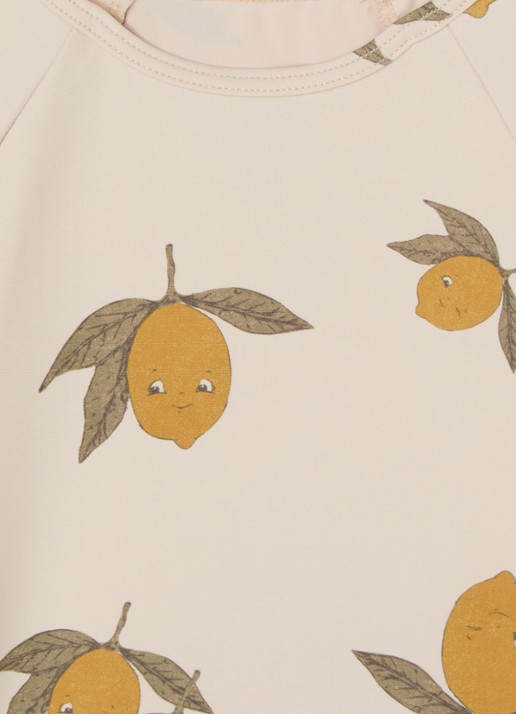 Konges Sløjd Aster uv-bestendig zwemshirt met print - detail beige