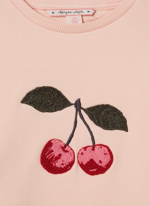Konges Sløjd Lou sweater met borduring - detail zalmroze