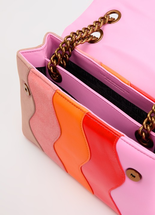 Kurt Geiger Kensington schoudertas van leer met suéde details  - detail roze
