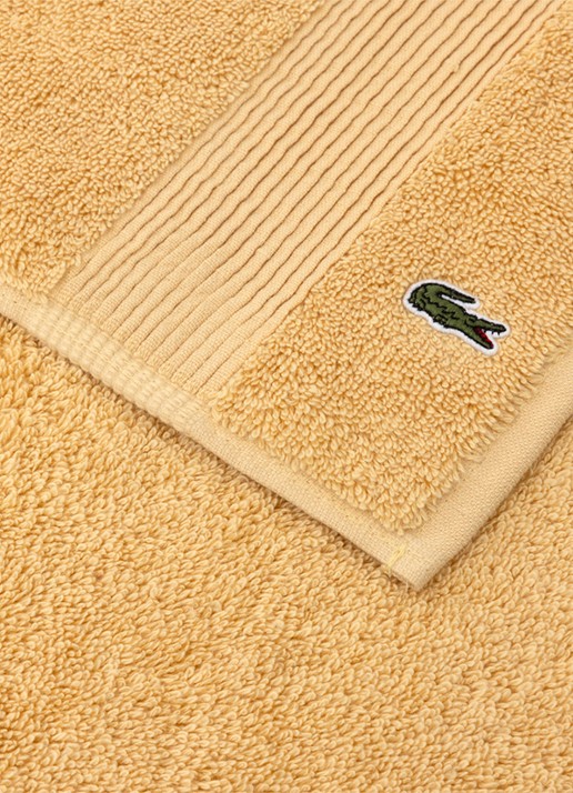 Lacoste L Lecroco badlaken - 600 gr/m2 -  70 x 140 cm - voorkant 2 lichtgeel