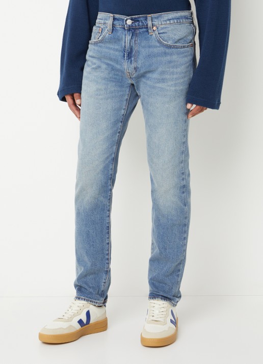 Levi's 502 slim fit jeans met medium wassing