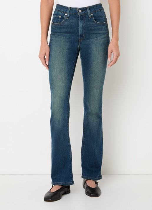 Levi's 725 high waist flared fit jeans met medium wassing