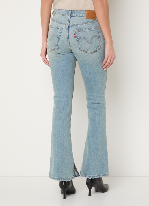 Levi's Mid waist bootcut jeans met lichte wassing en destroyed afwerking - achterkant 3 indigo