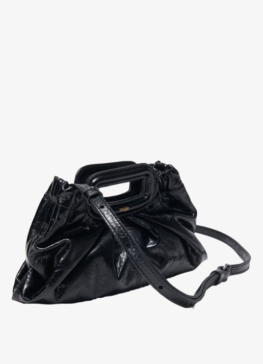 Maje Clutch van leer met afneembare schouderriem - detail zwart