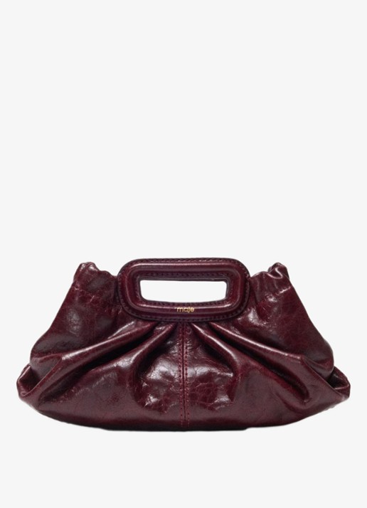 Maje Clutch van leer met afneembare schouderriem