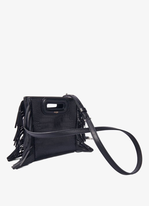 Maje Handtas van geitenleer met franjes - detail jeans