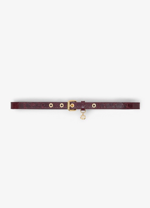 Maje Riem van koeienleer met charm