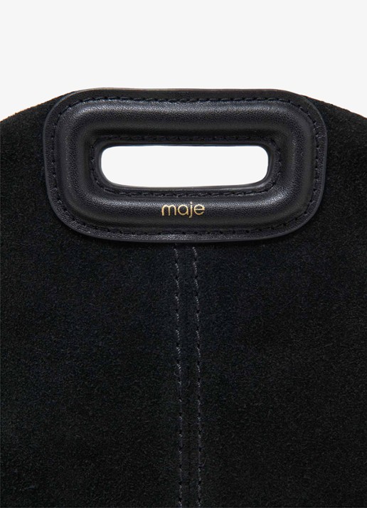 Maje Schoudertas van leer - detail jeans