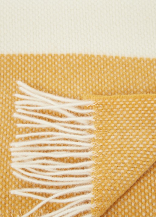 Malagoon Festivity plaid van lamswol 140 x 200 cm - detail donkeroranje