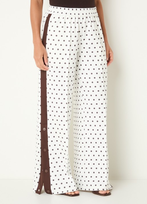 Neo Noir Meggie high waist straight fit trackpants met stippenprint