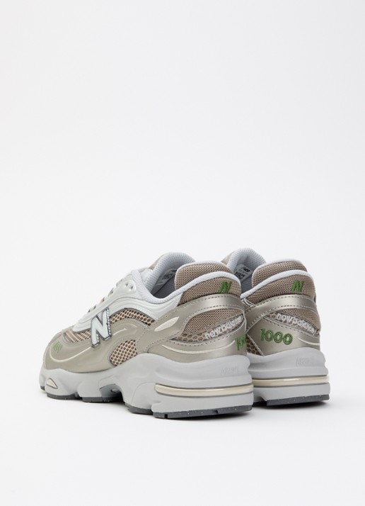 New Balance M1000 sneaker met mesh details - achterkant grijs