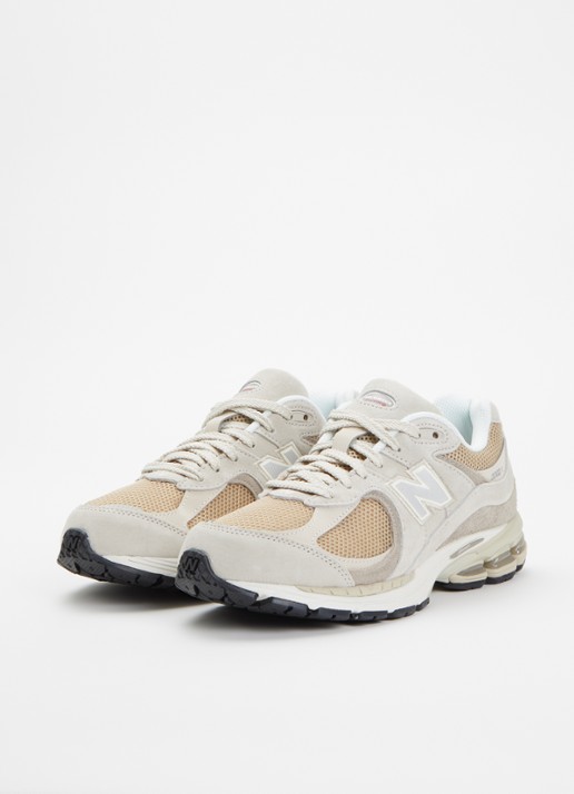 New Balance U2002 sneaker van suède met mesh details - detail taupe