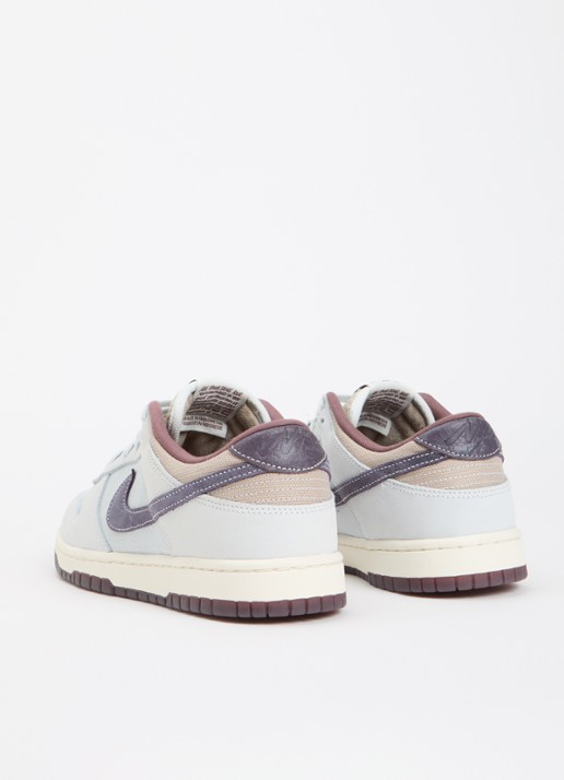 Nike Dunk Low Retro sneaker met logo - achterkant lichtblauw