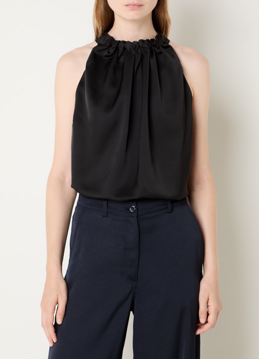 NIKKIE Aivy mouwloze top  met stretch - detail zwart