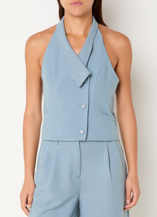 NIKKIE Alani mouwloze blazer met paspelzakken