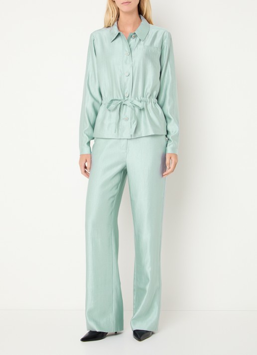 NIKKIE Alira blouse met metallic finish - voorkant 4 lichtblauw