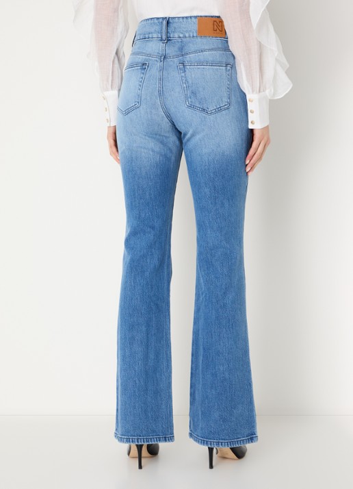 NIKKIE Piciba high waist flared jeans met gekleurde wassing - achterkant indigo