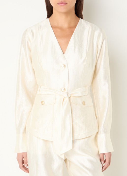 NIKKIE Porlamar blouse met metallic finish en strikdetail