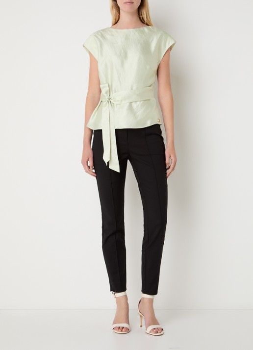 NIKKIE Porlamar top met metallic finish en strikdetail - voorkant 3 groen