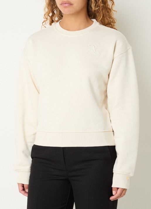 NIKKIE Swirl sweater met logoborduring