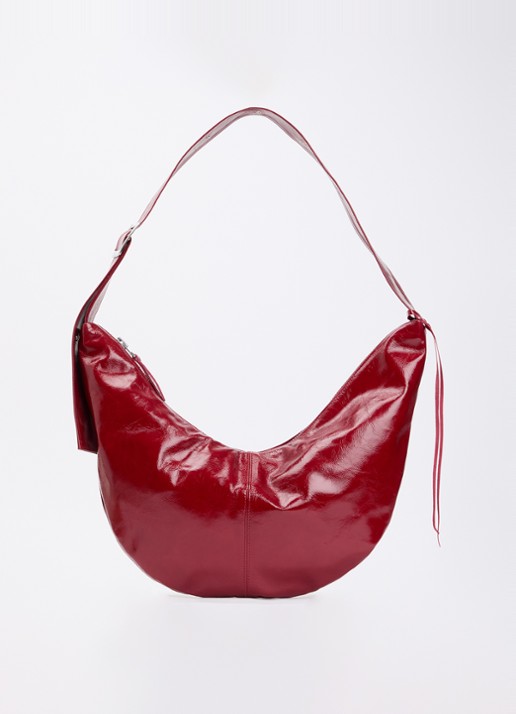 Nona Banana XL crossbodytas van lakleer met verstelbare schouderriem