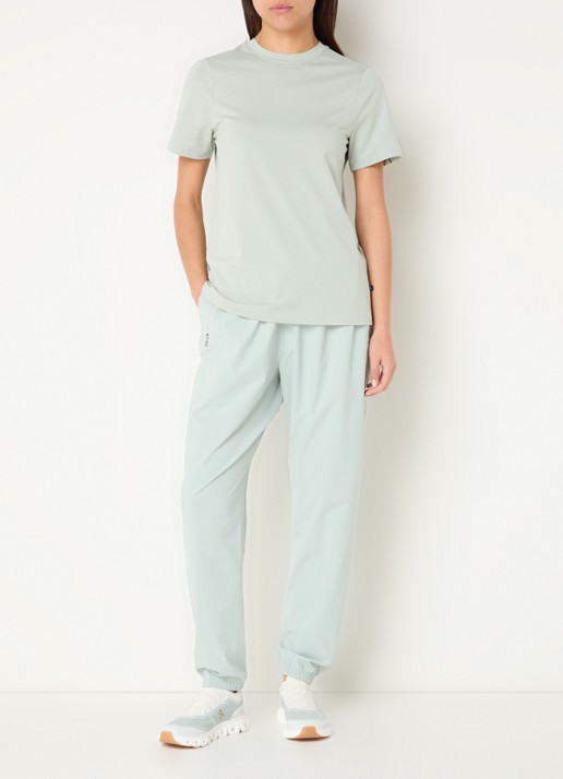 On Focus high waist tapered fit trackpants met steekzakken - voorkant 4 lindegroen