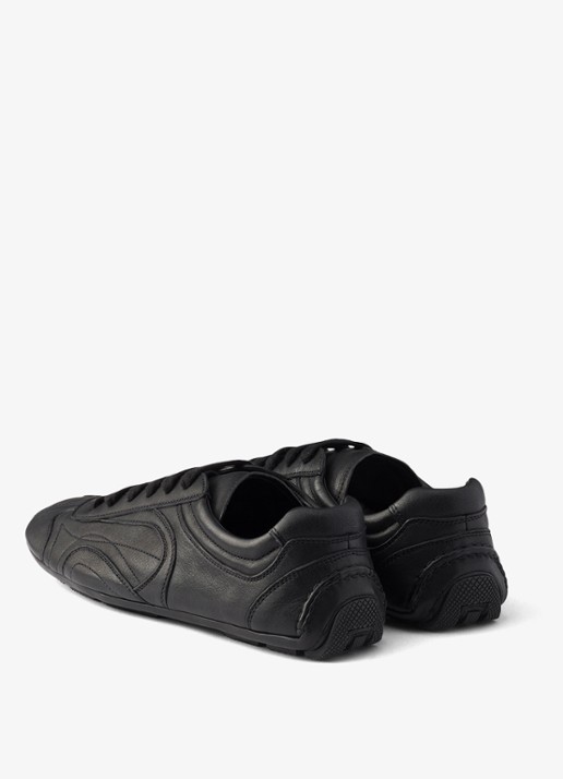 Prada Montecarlo Re-Edition 2005 sneaker van lamsleer - achterkant zwart