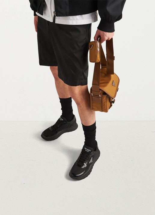 Prada Prax 01 Re-Nylon sneakers met leren details en logo - achterkant 3 zwart