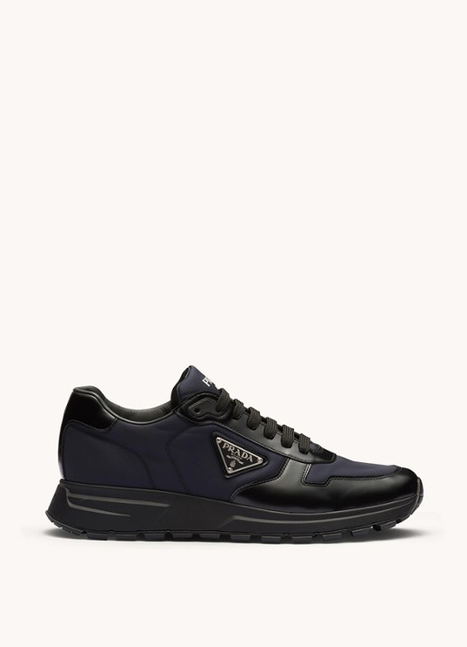 Prada Prax 01 Re-Nylon sneakers met leren details en logo - voorkant 3 donkerblauw