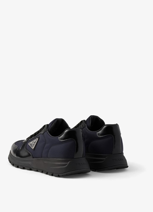 Prada Prax Re-Nylon sneaker met leren details - achterkant 3 donkerblauw