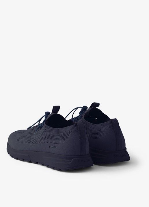 Prada Prax sneaker met gebreid bovenwerk - achterkant donkerblauw