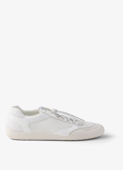 Prada Speedrock sneaker met lakleren en mesh details