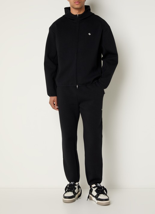 Represent 247 Numbers tapered fit joggingsbroek met logo en steekzakken - voorkant 5 zwart